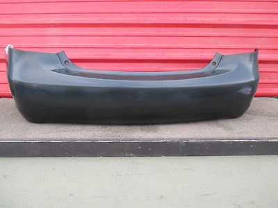07-11 Toyota Yaris sedán 4 puertas parachoques trasero cubierta fabricante de equipos originales 2007 2008 2009 2010 2011 Foto 1 de 4