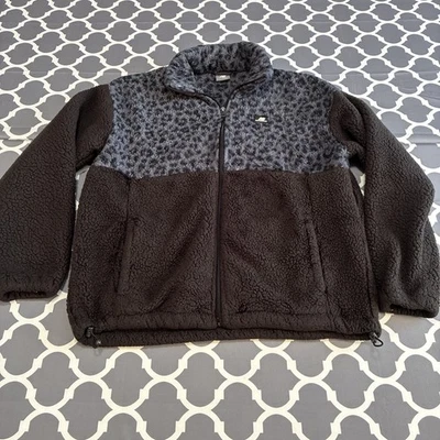 Chaqueta para mujer New Balance mediana polar Sherpa malva negra leopardo activa Foto 1 de 4