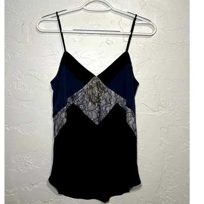 Camiseta sin mangas con correa de espagueti de encaje Express para mujer pequeña coqueta hada y2k Foto 1 de 4