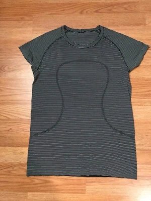 Camisa Lululemon Swiftly Tech para mujer 12 negra blanca a rayas logotipo raglán manga corta Foto 1 de 4
