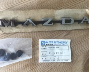 MAZDA R100 1200 1300 emblem bootlid Genuine NOS part 10A 12A 13B M10A Rotary - Picture 1 of 5