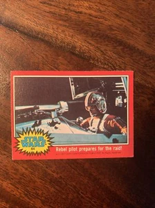 1977 Topps Star Wars Ser 2 Red #84 Rebel Pilot Prepares For The Raid! - Picture 1 of 2