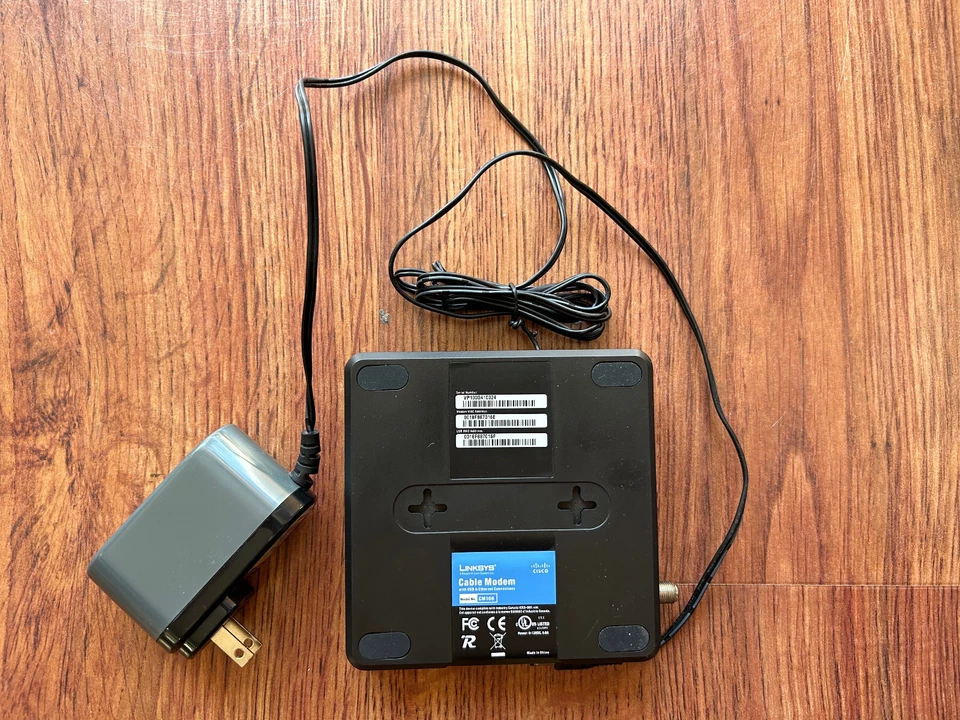 Cisco-Linksys Cable Modem CM100  - DOCSIS 2.0 - Power & Ethernet Cables included - Image 1 of 1