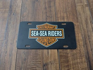 Vintage Restaurant Sea-Sea Riders Dunedin Flordia Nummernschild Booster Vanity - Bild 1 von 2
