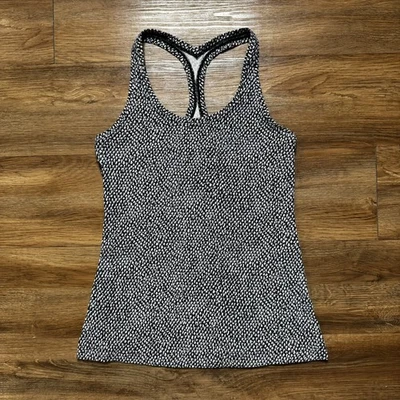 Camiseta sin mangas deportiva Lululemon para mujer 8 (estimada) negra blanca espalda deportiva elástica Foto 1 de 4