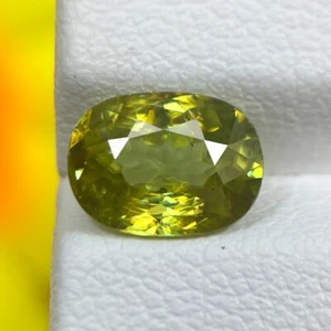 1.63ct Sphene Titanite Parrot Green Natural Oval Faceted Cut gem From Madagascar - Picture 1 of 3