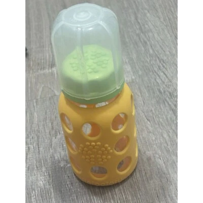 Biberones de vidrio Lifefactory con protección de silicona 4 oz amarillo Foto 1 de 4