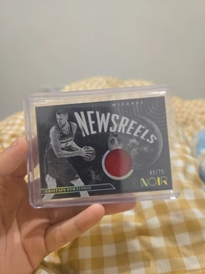 22-23 Panini Noir Newsreels Jerseys Kristaps Porzingis Prime Holo /75 Aus Seller - image 1 of 4