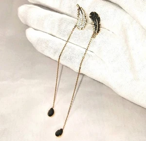SWAROVSKI Earrings Naughty Black and White Feathers Dangle Pendants in Rose Gold - Picture 1 of 7