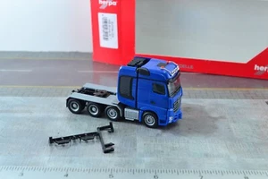 Herpa 307734 Mercedes Benz AROCS SLT 4 Axles Tractor Unit Truck Blue 1:87 HO - Picture 1 of 5