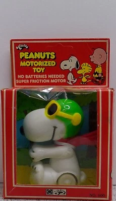 Juguete motorizado vintage Peanuts Snoopy Flying Ace Aviva todavía en paquete   Foto 1 de 4