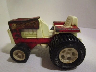 Vintage 1970's Tiny Tonka Farm Tractor Red & white For Restoration / Parts - Image 1 of 4