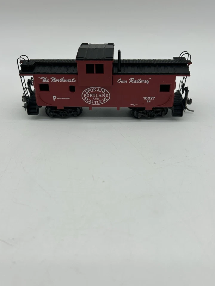 HO Athearn SPOKANE PORTLAND & SEATTLE - Wide Vision Caboose. 10027 Kadee Trucks - Image 1 of 4