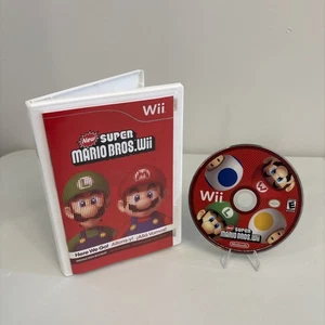 New Super Mario Bros. Wii (Nintendo Wii, 2009) Disc & Manual Only - Tested - Bild 1 von 4
