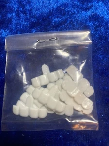 Nuevo lote de dientes de muñeca bebé acrílico Kemper stock antiguo. 6 juegos de 12 - Imagen 1 de 7