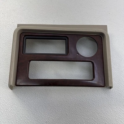 Radio tablero Cadillac Escalade 2002-2006 bisel central grano madera tostado fabricante de equipos originales Foto 1 de 4
