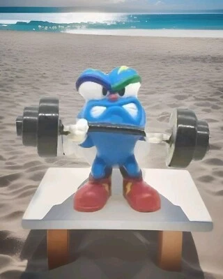 Figura de levantamiento de pesas olímpica Izzy mascota de los Juegos Olímpicos de Atlanta Foto 1 de 3