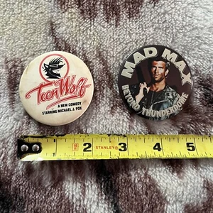 VINTAGE MOVIE PROMO 2" PINBACK BUTTONS TEEN WOLF Michael Fox MAD MAX 80s Ad VTG - Picture 1 of 4