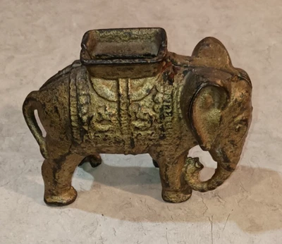 ELEPHANT WITH HOWDAH ANTIQUE CIRCA 1920'S CAST IRON PENNY BANK BY A.C. WILLIAMS - Image 1 of 4