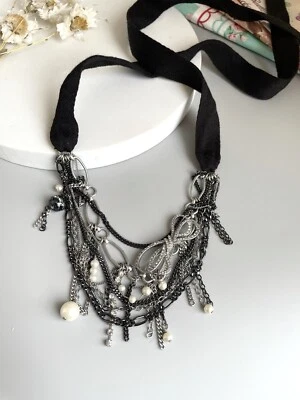 Collar de borlas llamativas tono plata Juicy Couture Foto 1 de 4