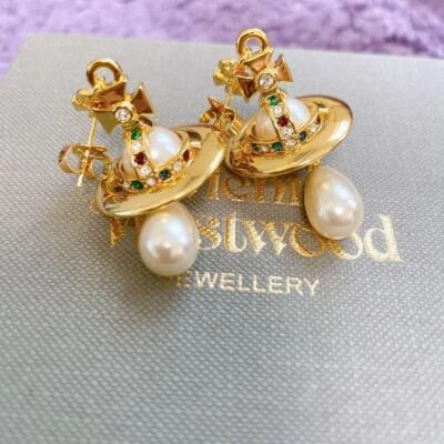 Vivienne Westwood halblange Perlen Ohrringe Gold weiße Kugel Tropfen ohne Box - Bild 1 von 2