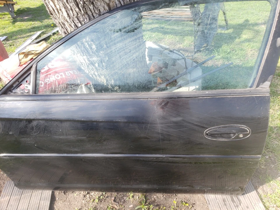 drivers side door with window and handle for 2004 Chevy Monte Carlo SS - Image 1 of 4