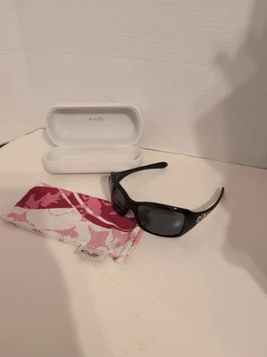 Gafas de sol OAKLEY RAVISHING cáncer de mama rosa pulido negro marco estuche 24-046 Foto 1 de 4