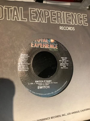 Switch.  Switch  it baby  . 7” vinyl. 1984. Total experience - Image 1 of 2