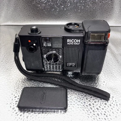 Cámara fotográfica Ricoh Auto Half EF2 medio marco con cubierta y correa - sin probar para piezas Foto 1 de 4