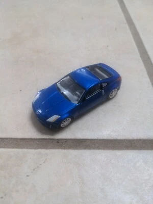 2004 Johnny Lightning Fast & Furious 2003 Nissan 350z Blue w/Chrome Wheels Car - Image 1 of 4