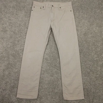 Pantalones de mezclilla Levis Jeans para hombre 33x30 beige 513 calce ajustado tiro bajo caqui cremallera mosca Foto 1 de 4