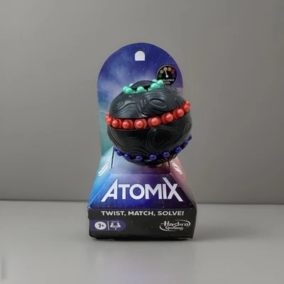 Hasbro~Gaming~Atomix Puzzle Ball~Twist/Match/Solve~Brain Teaser Toy~All Ages - Image 1 of 4