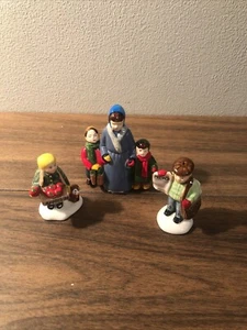 Department 56 figurines newspaper boy apple girl and a mother and her children - Picture 1 of 6