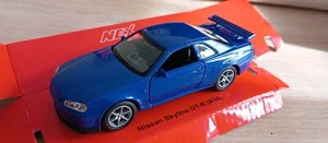 WELLY - NISSAN SKYLINE GT-R R34 AZUL 1:34-1:38 *NUEVO* - Imagen 1 de 9