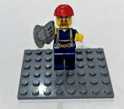 Lego Minifig Construction Worker with Red Helmet and Saw - Image 1 of 4