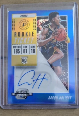 Aaron Holiday 2018-19 Contenders Optic Rookie Ticket RC Auto Blue Prizm /99 - Image 1 of 2