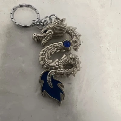 Cambio de llave dragón marino serpiente ojos azules Foto 1 de 4