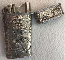 A George III Etui Of Tapering Form With Embossed And Chased Decoration