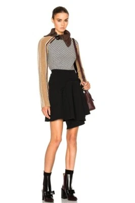 FALDA ACAMPANADA TALLADA ASIMÉTRICA NEGRA EMBELLECIDA M (Orig. $442) Foto 1 de 4