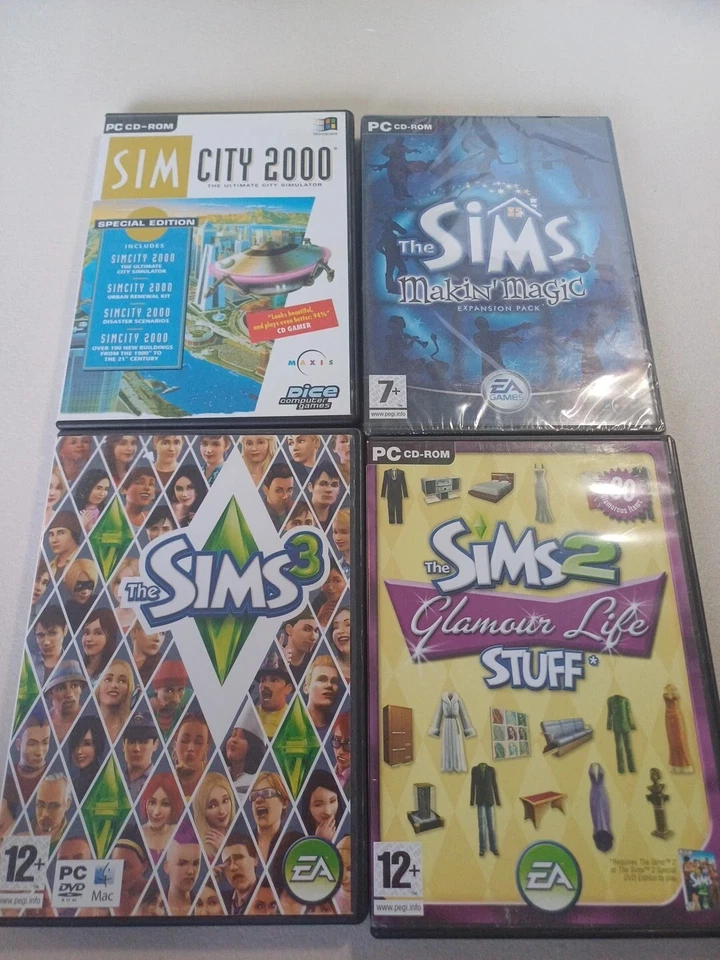 4 SIMS PC GAMES/EXPANSIONS. SOME WITH SCRATCHES,  ONE SEALED. Electronic Arts  - Image 1 of 1