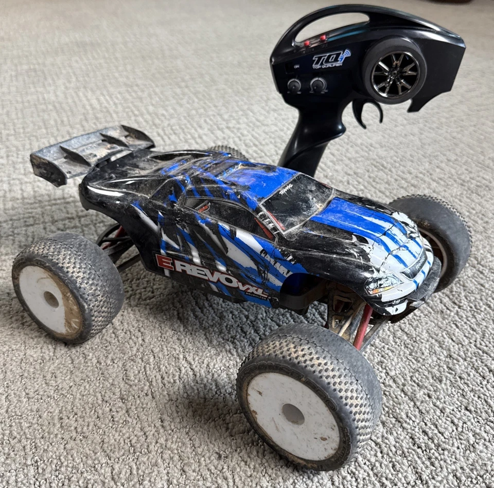 Traxxas Mini E-Revo 1/16 Scale Remote Truck VXL RTR Dirty Untested For Parts - Image 1 of 4