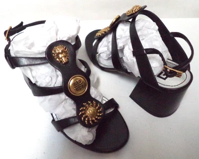 Sandalias de tacón Givenchy con tiras logotipo de sol de león apliques Italia negras talla 35 EE. UU. 5 Foto 1 de 4