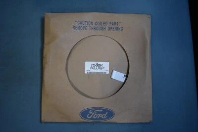 Кабель заднего стояночного аварийного тормоза Ford E7DZ-2A635-D от оригинального производителя новый из старых запасов подлинный заводской - Изображение 1 из 3