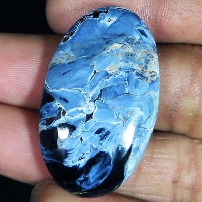 Piedra preciosa cabujón ovalada natural Chatoyant PIETTERSITE 57,50 quilates 23x39x8 mm YU107 Foto 1 de 4