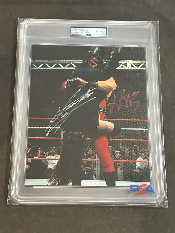 THE UNDERTAKER & KANE DUAL SIGNED AUTOGRAPHED 8X10 PHOTO PSA/DNA CERTIFIED - Image 1 of 1
