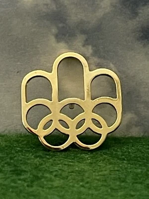 1976 MONTREAL OLYMPIC NOC PIN GOLD PLATED OLYMPIC RINGS PIN - Image 1 of 3
