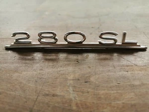 Logotipo 280SL tapa radio Mercedes Benz Pagoda / Type logo radio delete plate. - Imagen 1 de 2