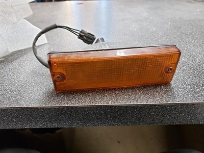 Parachoques de luz de estacionamiento/esquina de pasajero montado para 88-95 ISUZU CACHORRO (RECOGIDA) 175415 Foto 1 de 3