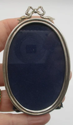 CARTIER STERLING SILVER SMALL OVAL PICTURE FRAME with BOW ~ STANDING - Image 1 of 4