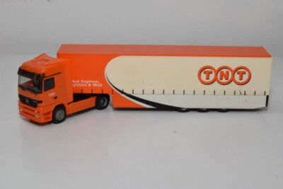 B54 1:87 HERPA MERCEDES-BENZ ACTROS TRUCK TRAILER TNT GLOBAL EXPRESS EXC. COND. - Immagine 1 di 4